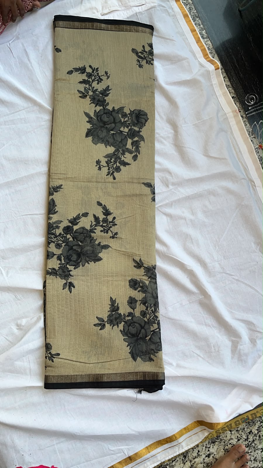Cream with black flower print fancy saree